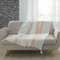 PLAID A POMPONS 125X150CM COTON TISSE FILS ARG INDIRA ROSE